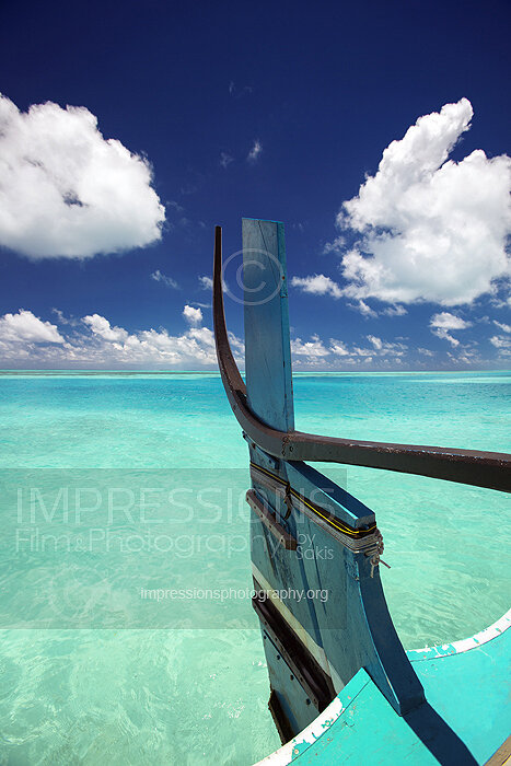Maldives Traditional dhoni boat at tropical beach