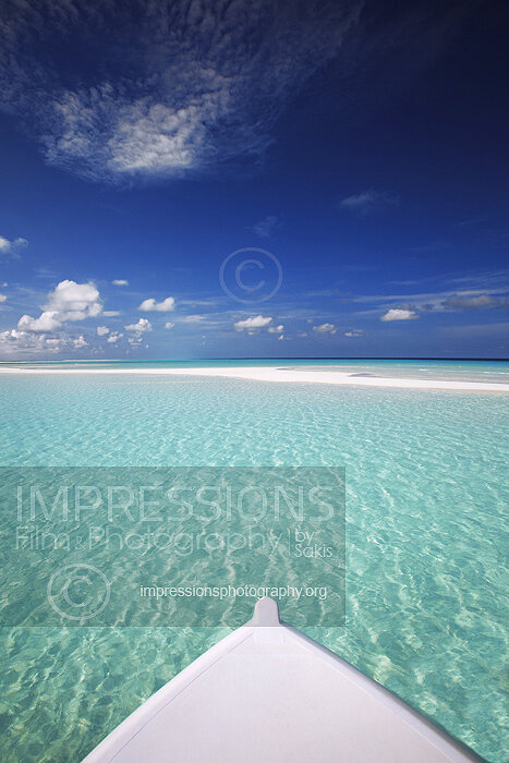 Maldives Traditional dhoni boat - dhoni bow and lagoon