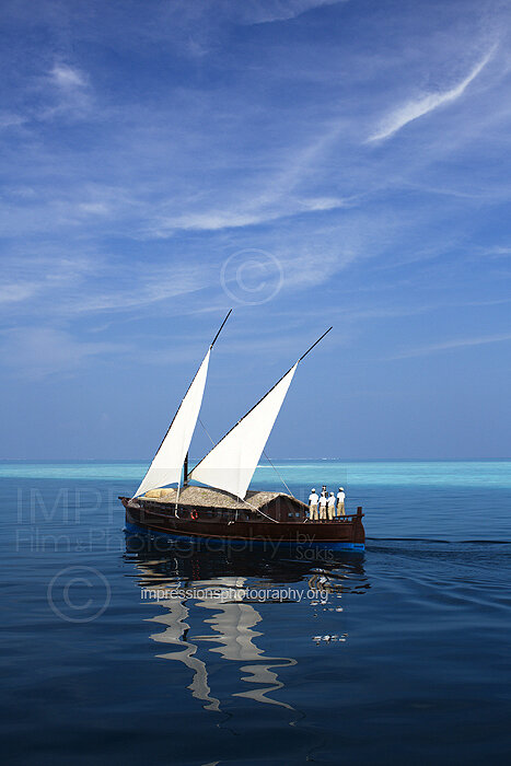 Maldives Traditional dhoni boat sailing on ocean