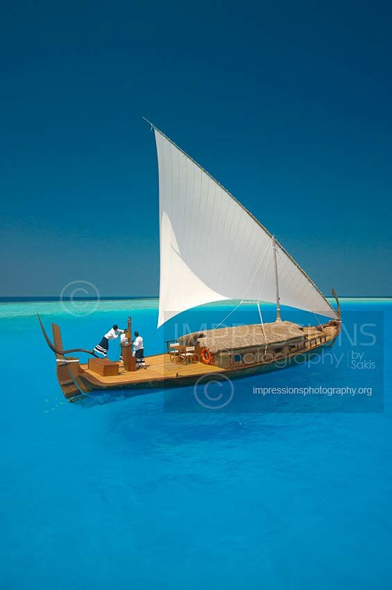 maldives maldivian traditional boat dhoni and lagoon stock photo