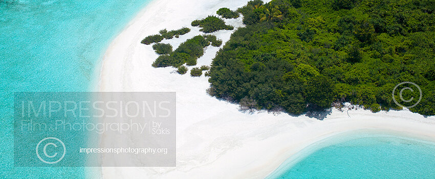 Aerial view of a beach and island in the Maldives