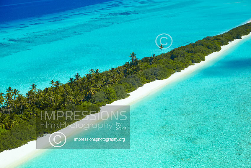 Aerial view of a beach and island in the Maldives