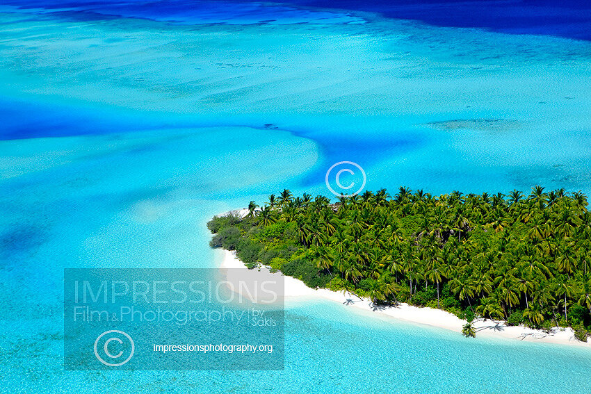 Aerial view of a beach and island in the Maldives