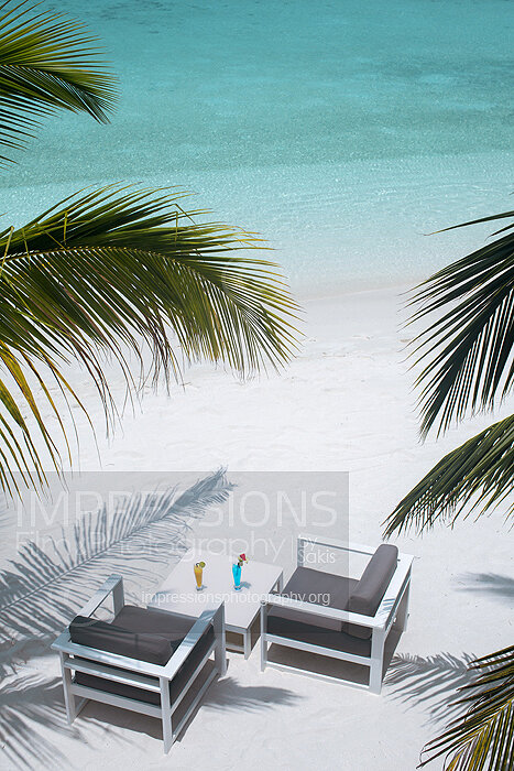 Chairs on tropical Beach Stock Photo
