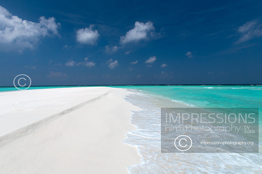 Maldives sandbank with turquoise lagoon