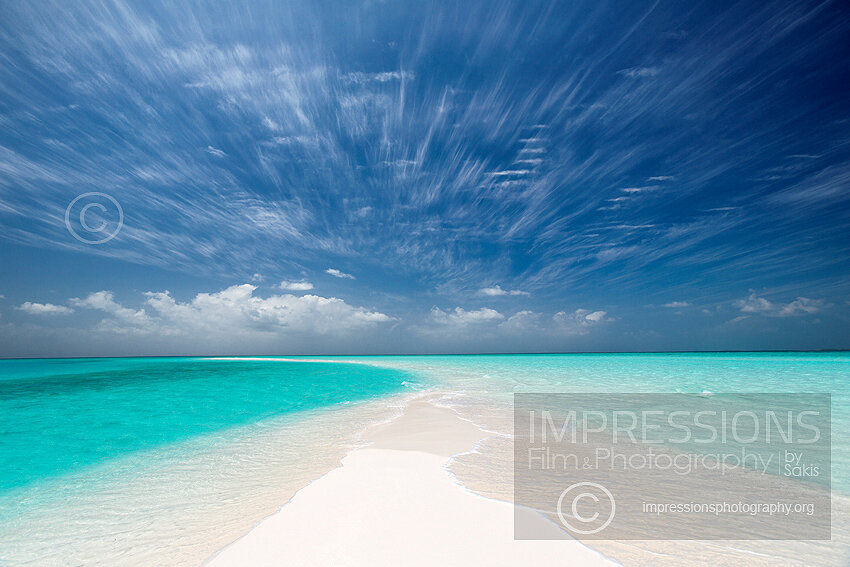 Maldives sandbank with turquoise lagoon