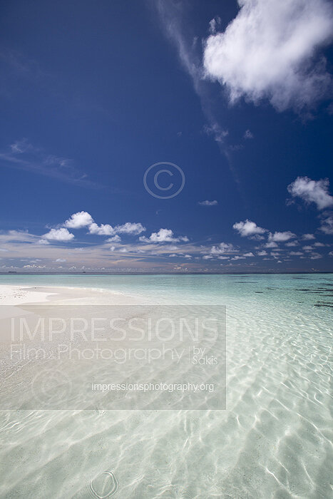 Maldives sandbank with turquoise lagoon