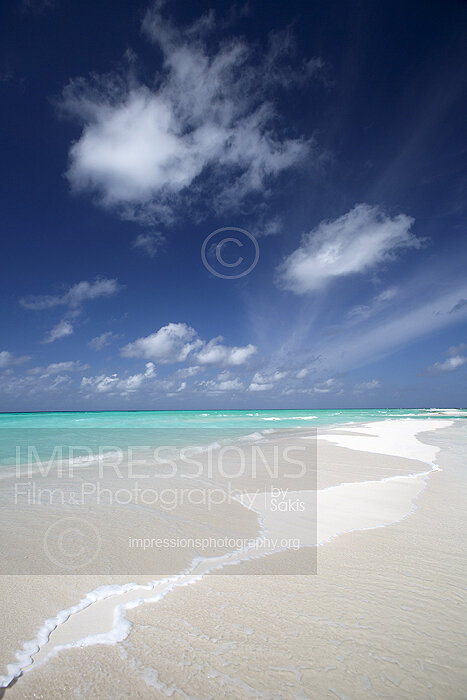 Maldives sandbank with turquoise lagoon