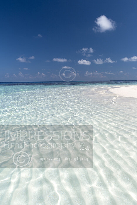 Maldives sandbank with turquoise lagoon