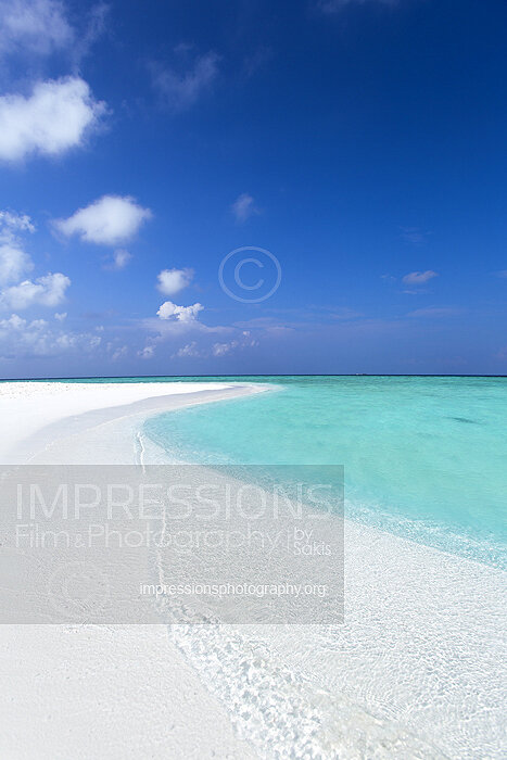 Maldives sandbank with turquoise lagoon