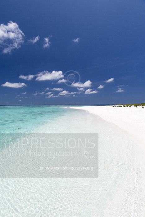 Maldives sandbank with turquoise lagoon