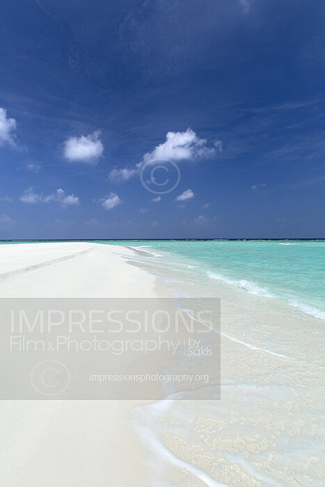 Maldives sandbank with turquoise lagoon