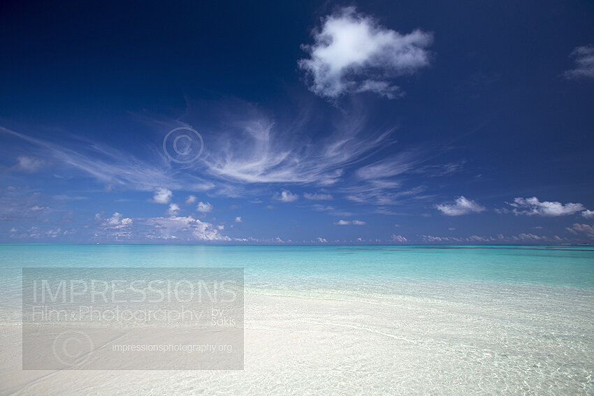 Maldives sandbank with turquoise lagoon