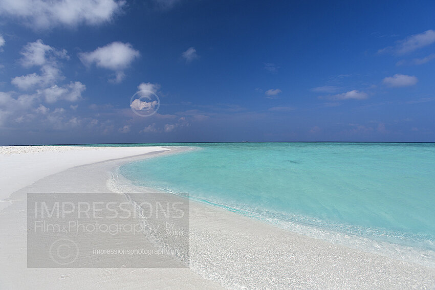 Maldives sandbank with turquoise lagoon
