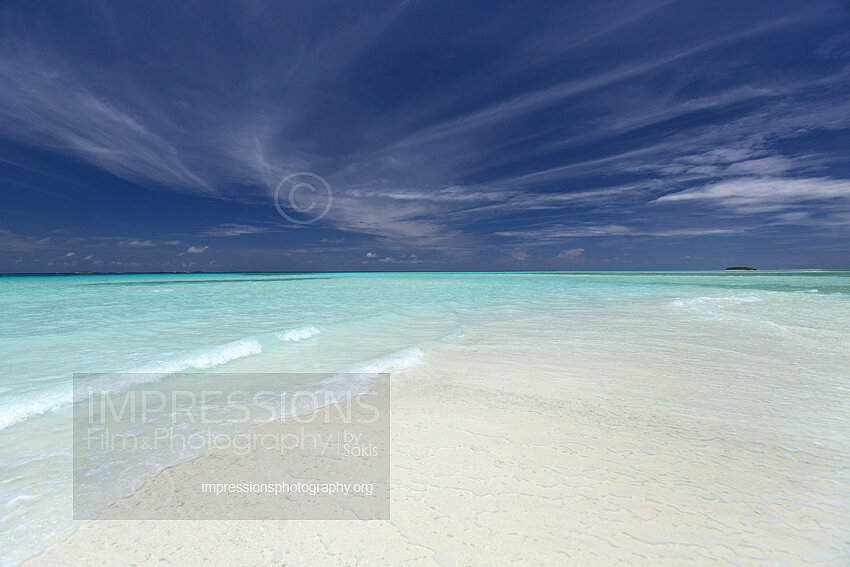 Maldives sandbank with turquoise lagoon