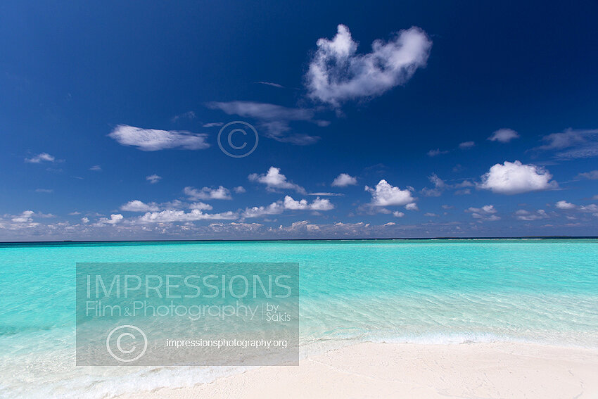 Maldives sandbank with turquoise lagoon