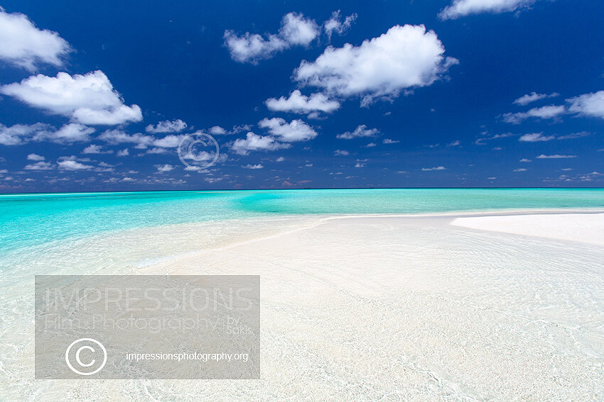 Maldives sandbank with turquoise lagoon