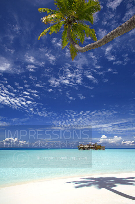 tropical beach in Maldives and water villas Stock Photo