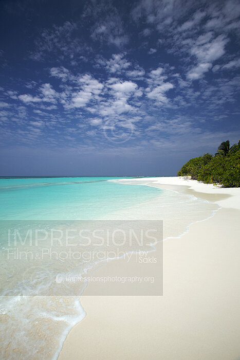 Maldives tropical beach and blue lagoon on desert island stock photo