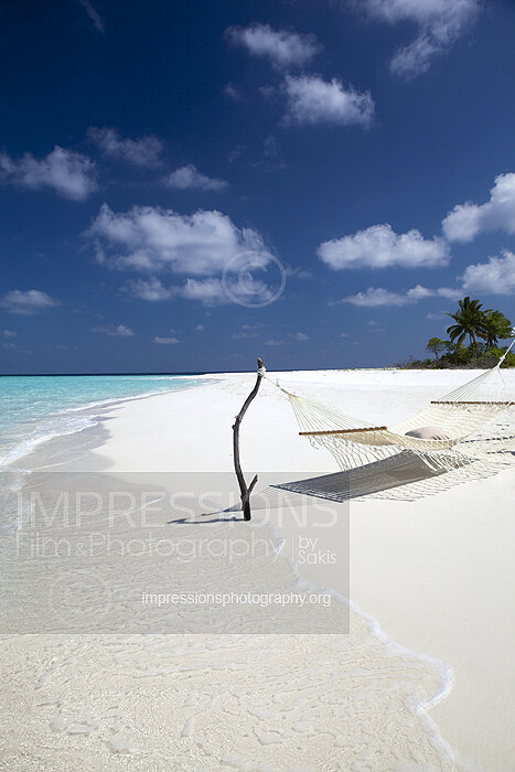 Hammock on a tropical beach in Maldives