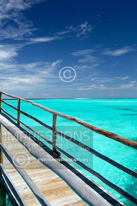 Maldives stock photo of a wooden pier over blue lagoon