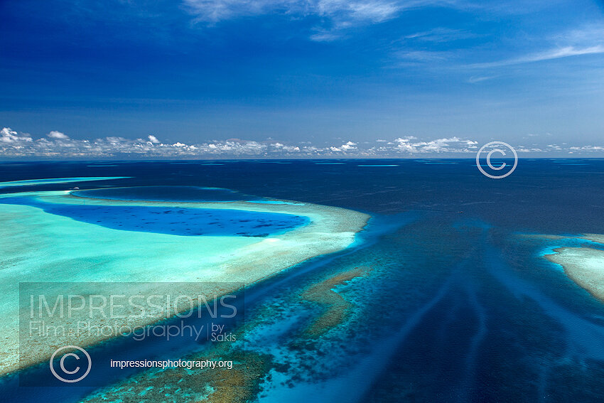 Maldives, Aerial view of coral reefs and sandbank