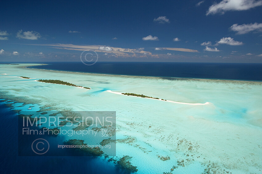 Maldives, Aerial view of coral reefs and islands