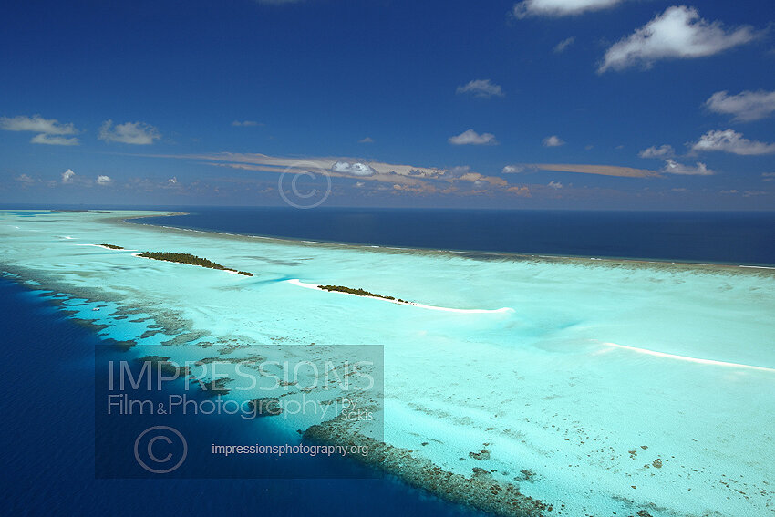 Maldives, Aerial view of coral reefs and islands