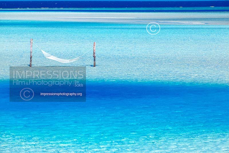 Maldives, water hammock in turquoise blue lagoon Stock Photo