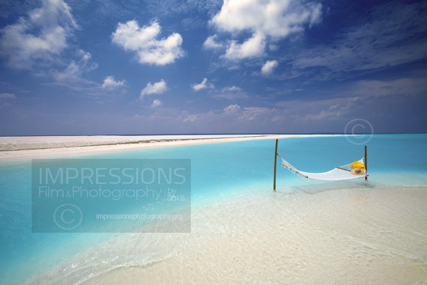 Hammock on the edge of tropical beach, Maldives stock photo