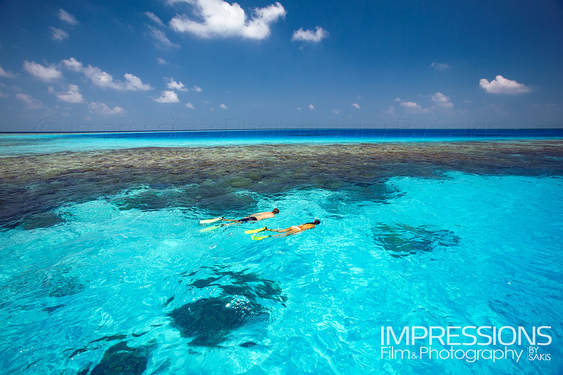 Lifestyle Photography - Couple of snorkelers Gili Lankanfushi Maldives