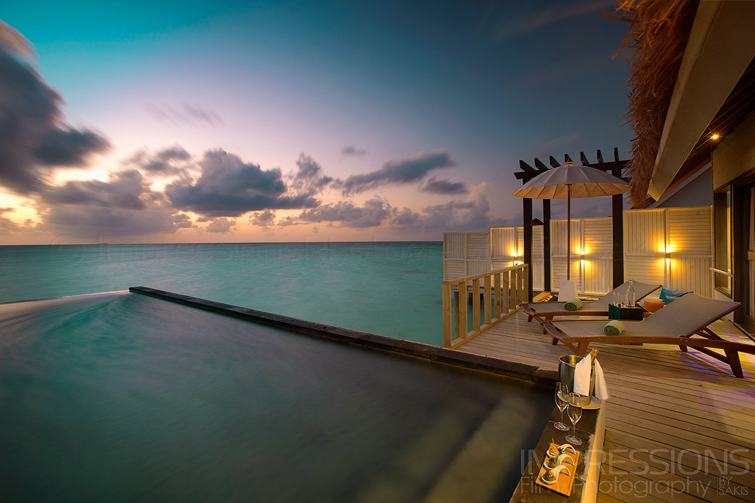 Sunset mood shot of the water villa deck OZEN Maldives