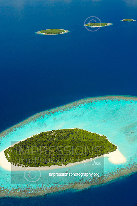 Maldives, aerial view of desert islands baa atoll