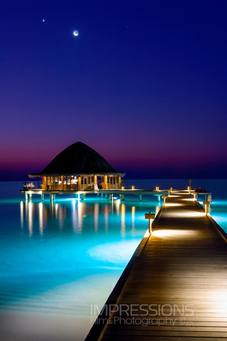 angsana velavaru jetty dusk resort hero shot