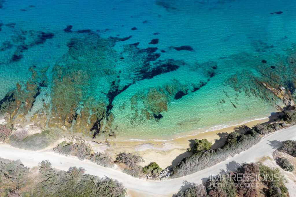 Aerial photography drone view of a beach of a luxury contemporary villa in Cyclades Naxos Greece