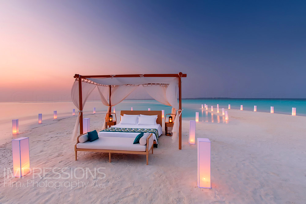 Sleeping on a sandbank. Lifestyle shot for Milaidhoo Island Maldives luxury Resort photography 