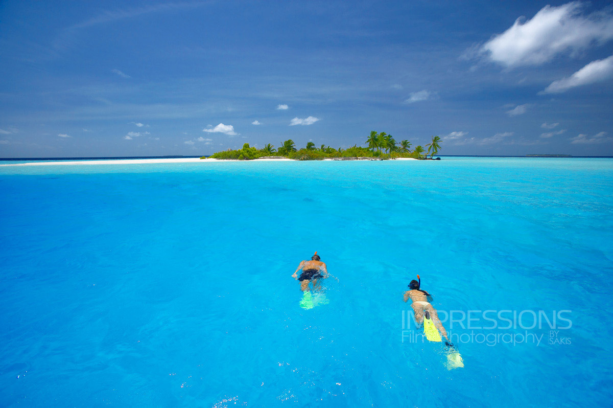 maldives photography couple snorkeling