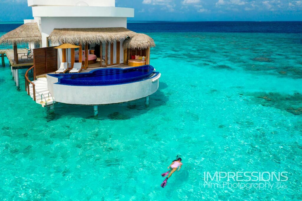 oblu sangeli resort drone photography aerial overwater villa