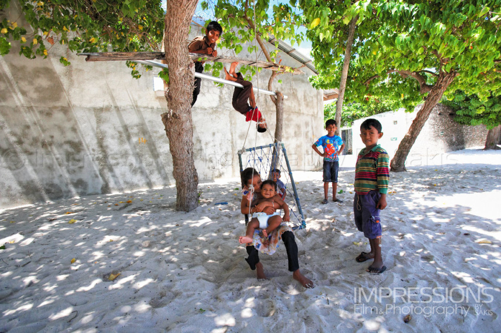 photo of maldivian children playing on a Maldives local island