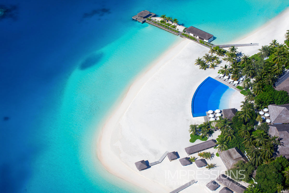 velassaru resort hero shot aerial beach infinity pool photography