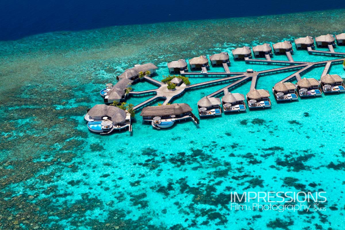 w maldives resort aerial photography water villas