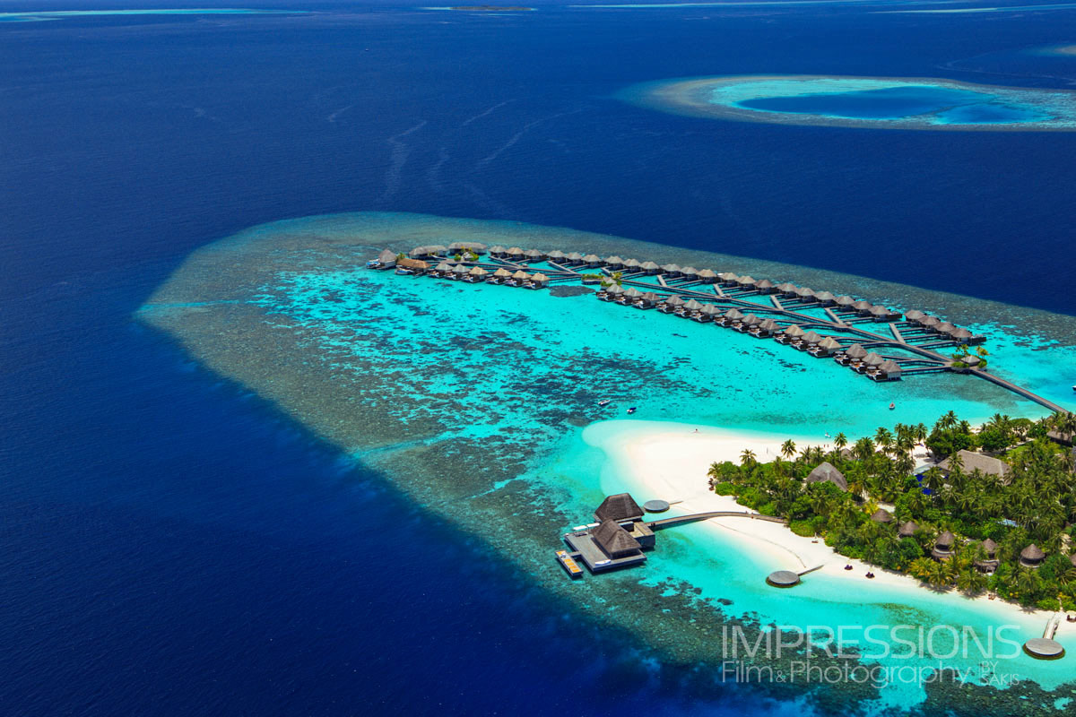 w maldives resort hero shot aerial island overview